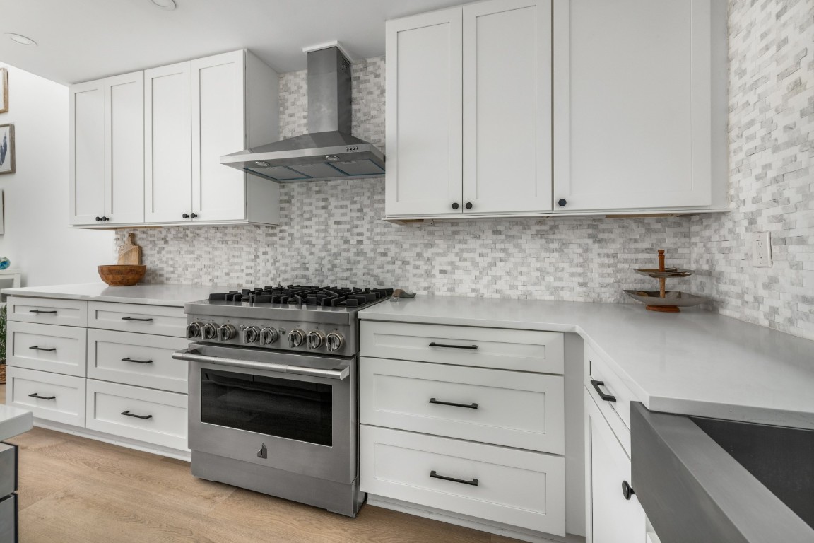 3422 Sea Marsh Road Fernandina Beach, FL 32034 - Photo 12 of 42 a kitchen with cabinets appliances and a sink