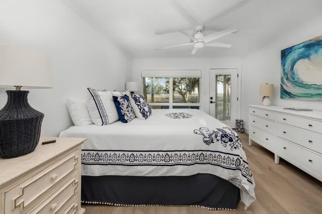 a bedroom with a bed and a dresser