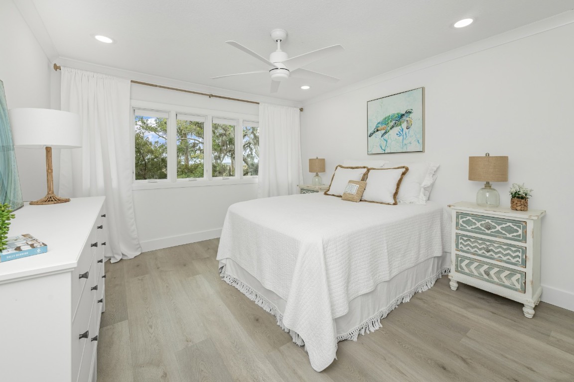 3422 Sea Marsh Road Fernandina Beach, FL 32034 - Photo 25 of 42 a bedroom with a bed and a window