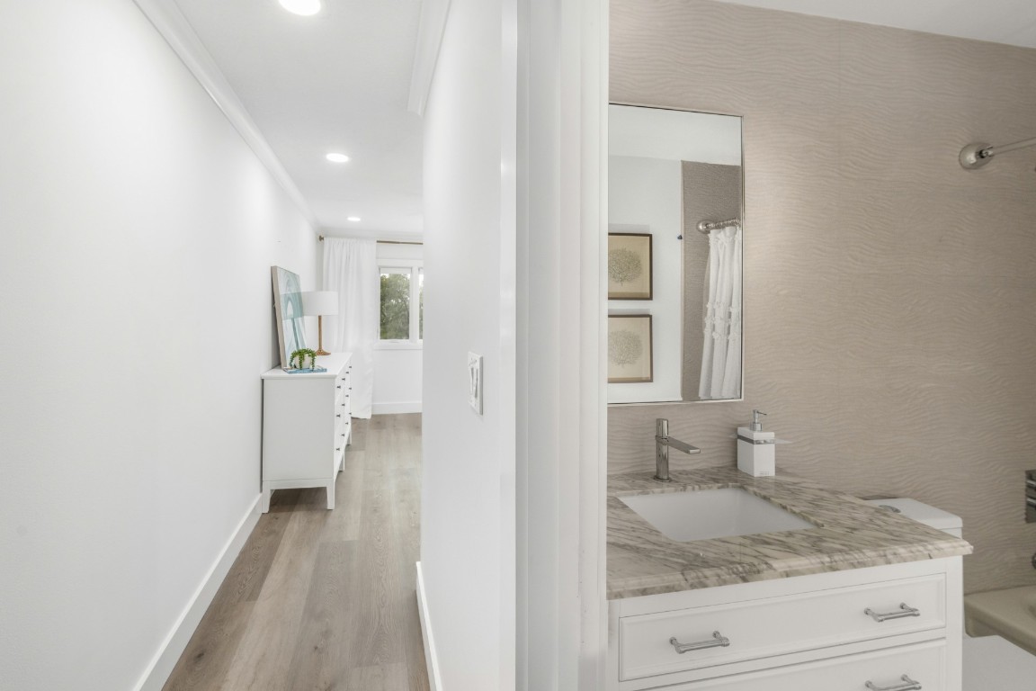 3422 Sea Marsh Road Fernandina Beach, FL 32034 - Photo 26 of 42 a view of bathroom with a sink and mirror