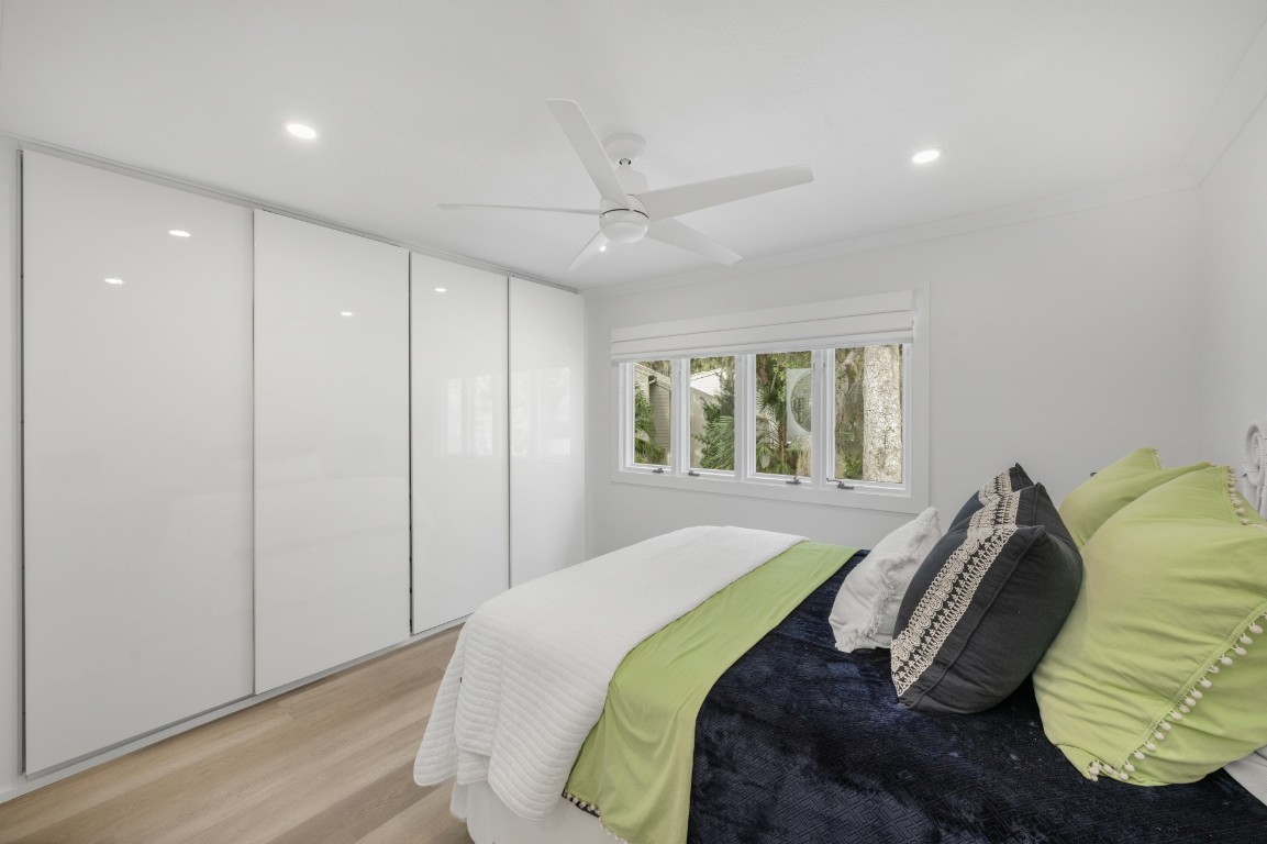 3422 Sea Marsh Road Fernandina Beach, FL 32034 - Photo 29 of 42 a bedroom with a bed and a window