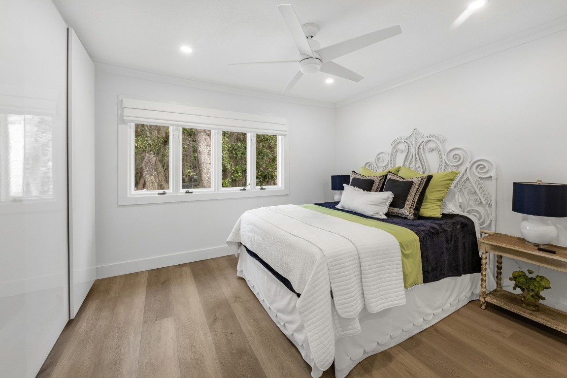 3422 Sea Marsh Road Fernandina Beach, FL 32034 - Photo 31 of 42 a bedroom with a bed and a window