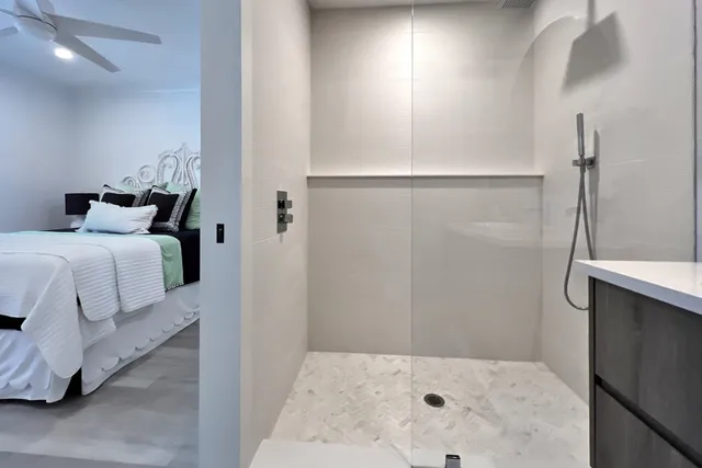 a bedroom with a bed and a table