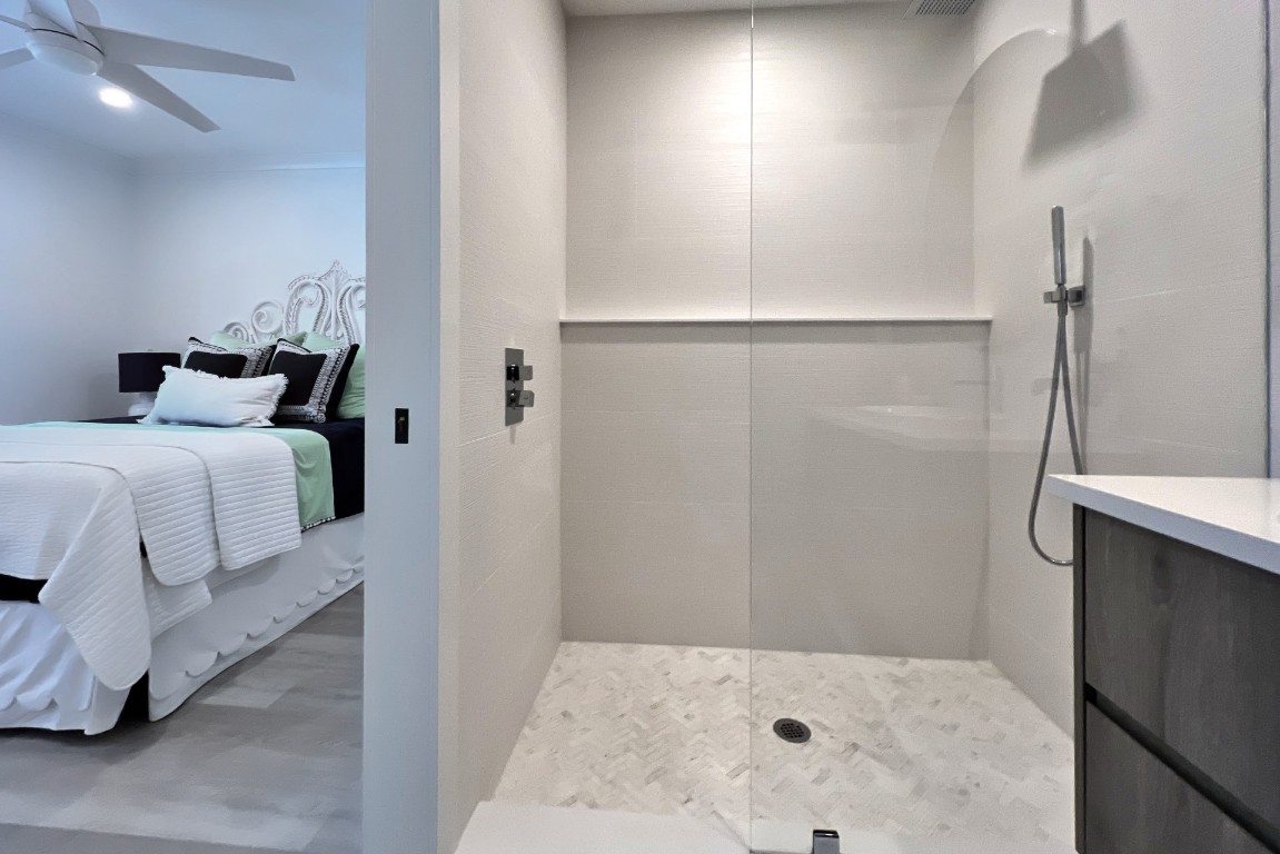 3422 Sea Marsh Road Fernandina Beach, FL 32034 - Photo 32 of 42 a bedroom with a bed and a table