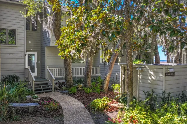 a backyard of a house with lots of green space