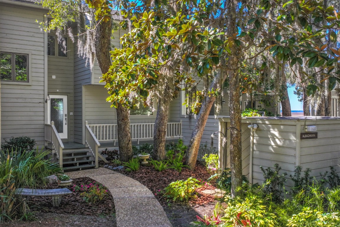 3422 Sea Marsh Road Fernandina Beach, FL 32034 - Photo 35 of 42 a backyard of a house with lots of green space