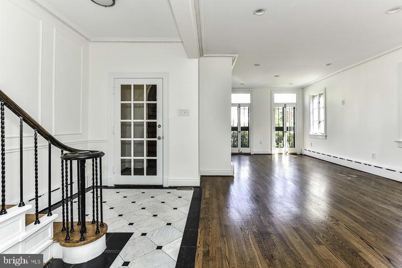 3222 Klingle Road Northwest Washington, DC 20008 - Photo 2 of 46 a view of a living room and wooden floor