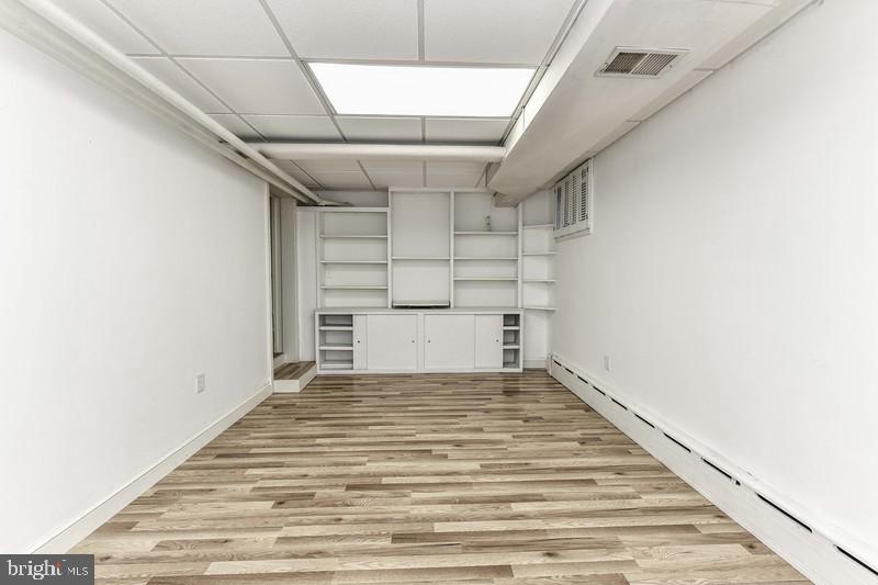 3222 Klingle Road Northwest Washington, DC 20008 - Photo 33 of 46 a view of a big room with an empty space