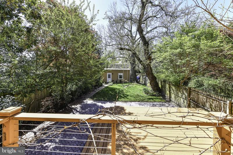 3222 Klingle Road Northwest Washington, DC 20008 - Photo 44 of 46 a view of a house with a yard