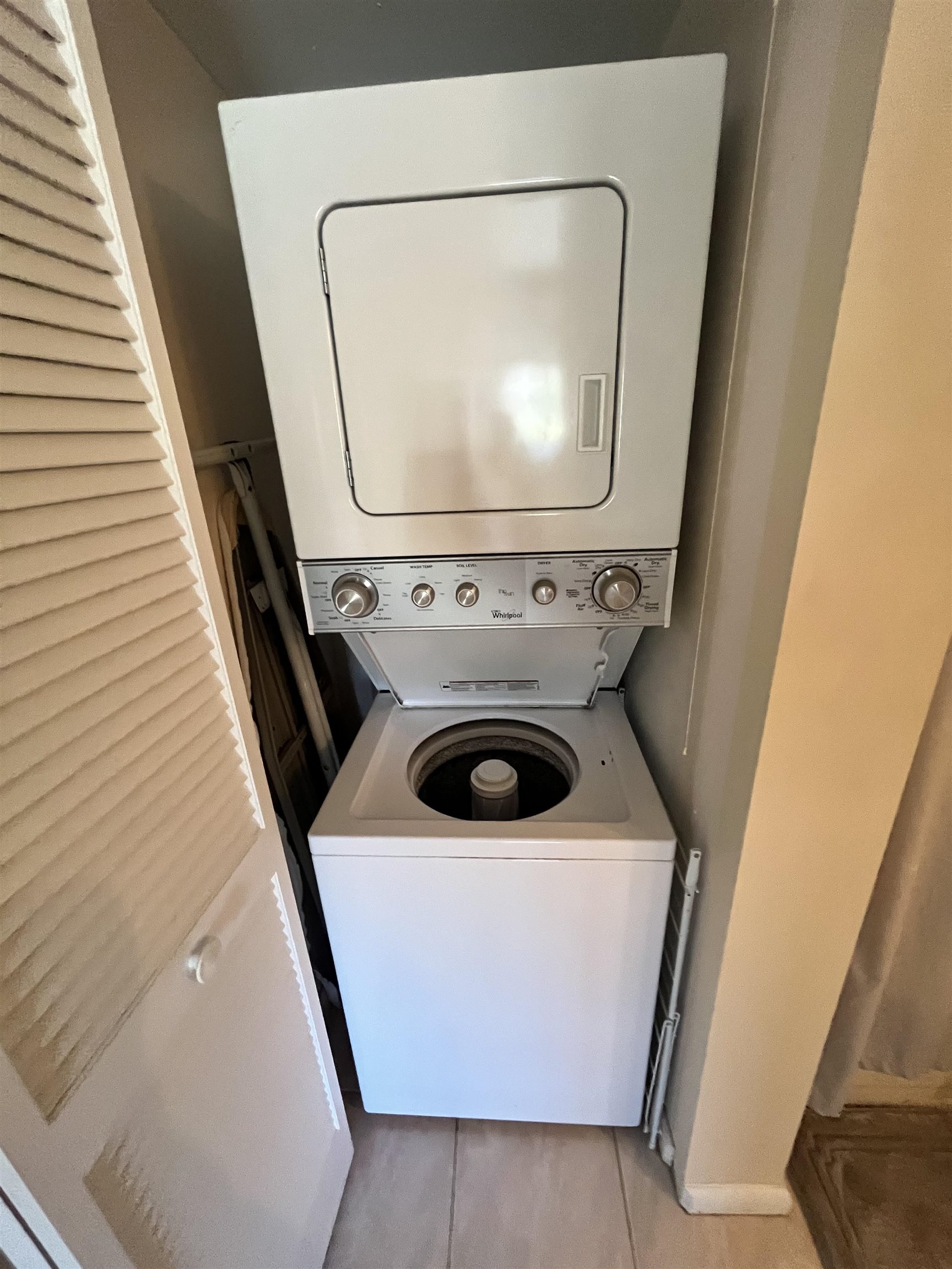4250 A1A South, Unit C12 St. Augustine, FL 32080 - Photo 12 of 15 a utility room with dryer and washer