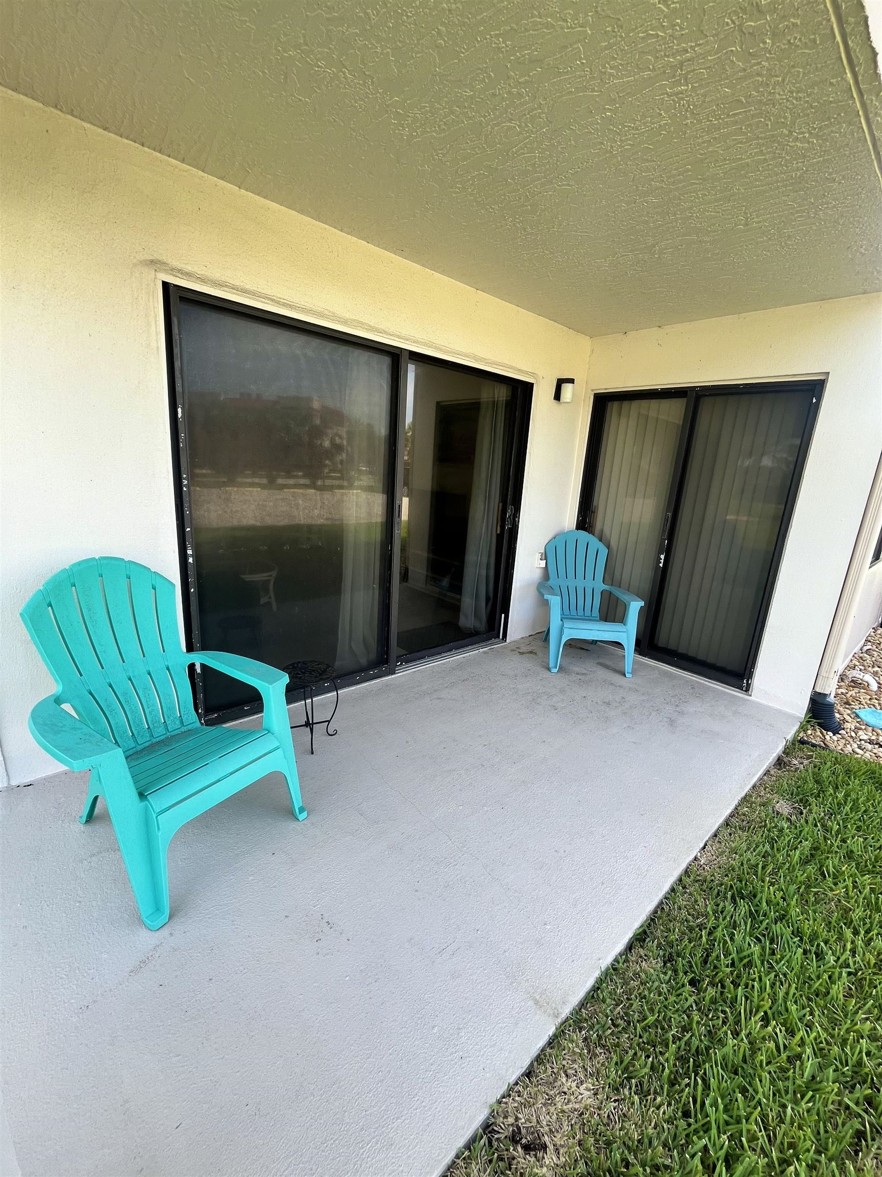 4250 A1A South, Unit C12 St. Augustine, FL 32080 - Photo 13 of 15 a backyard of a house with barbeque oven