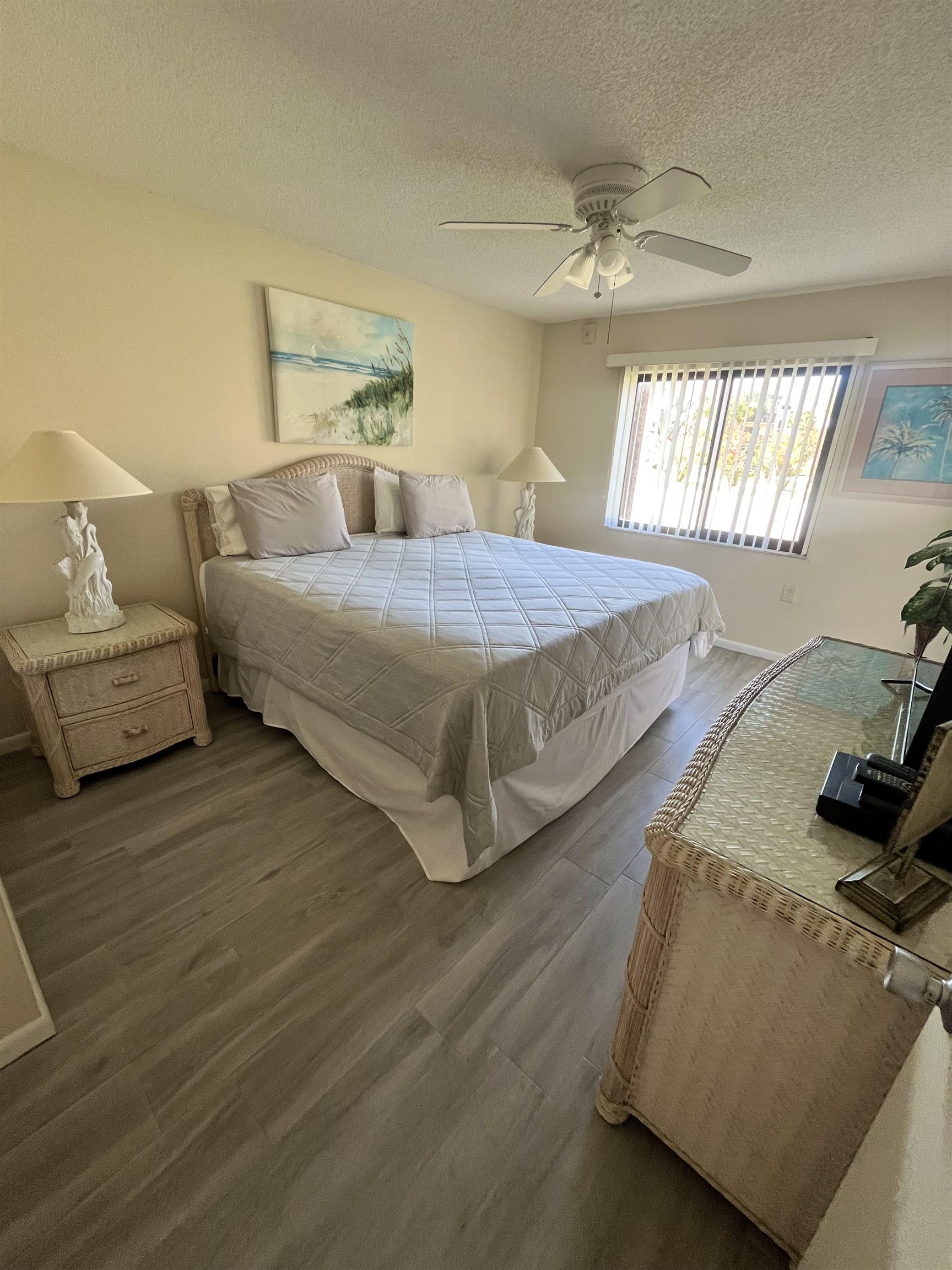 4250 A1A South, Unit C12 St. Augustine, FL 32080 - Photo 9 of 15 a bedroom with a bed and window