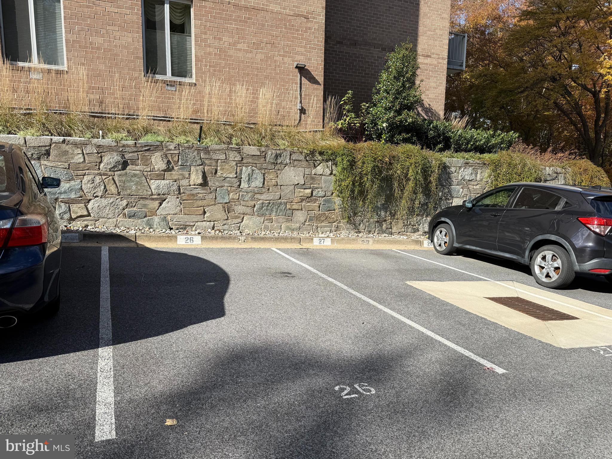 2939 Van Ness Street Northwest, Unit 630 Washington, DC 20008 - Photo 13 of 25 a car parked in front of a building
