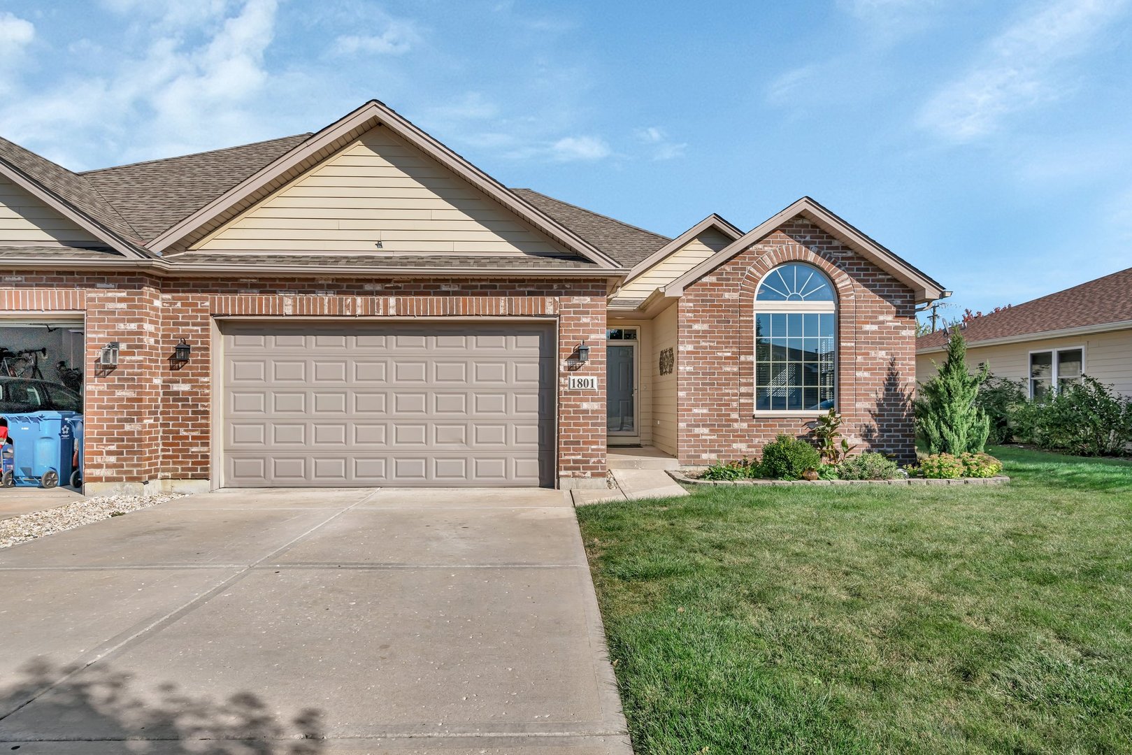 1801 Red Willow Road Morris, IL 60450 - Photo 1 of 29 a front view of a house with a yard and garage
