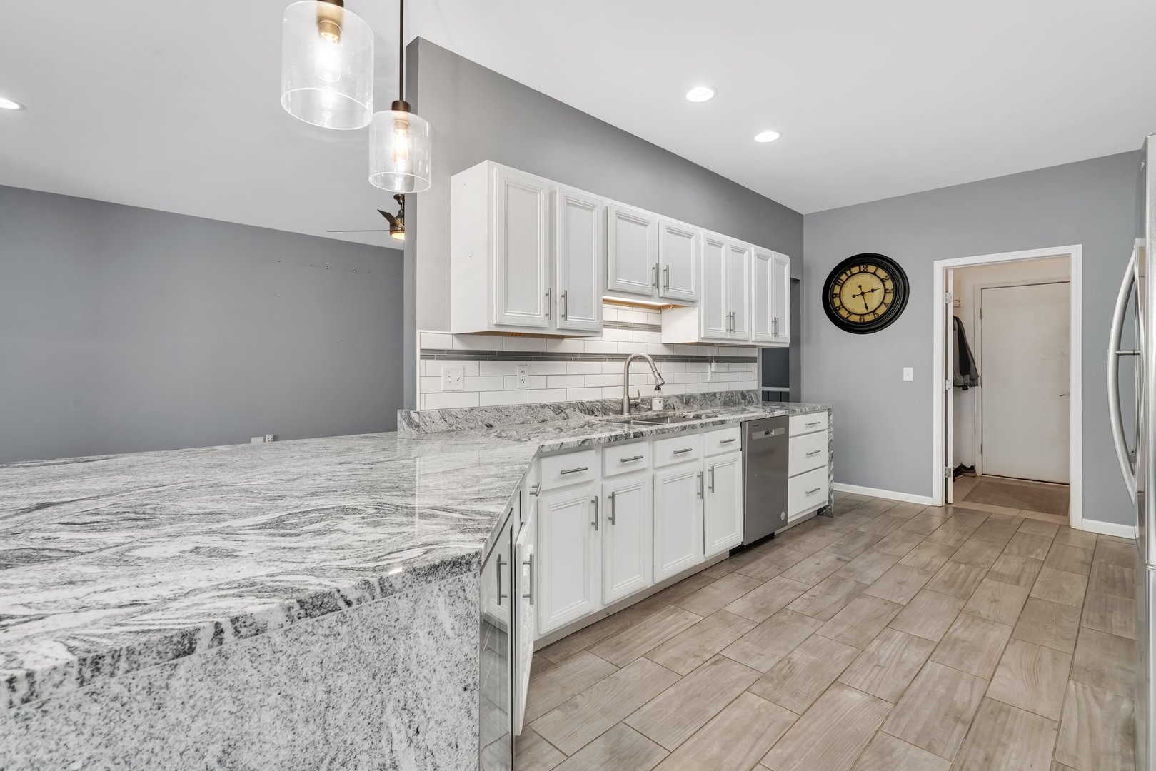 1801 Red Willow Road Morris, IL 60450 - Photo 13 of 29 a kitchen with granite countertop a sink cabinets and stove
