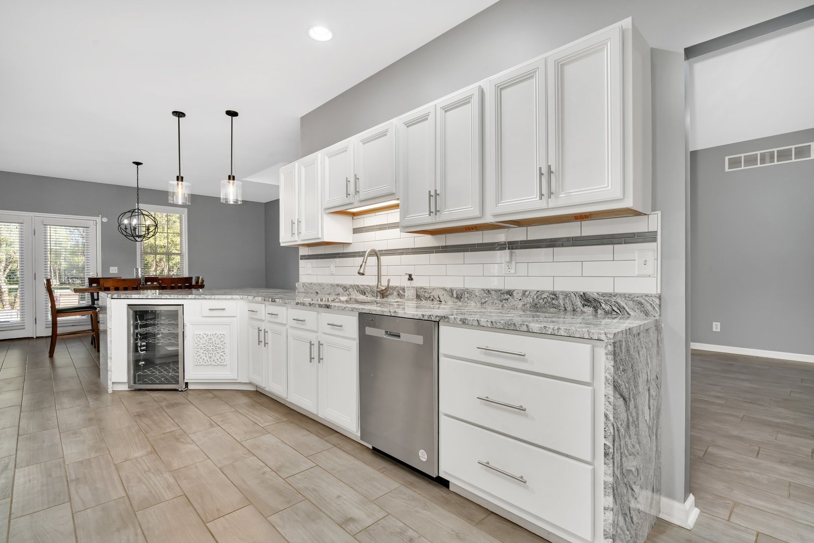 1801 Red Willow Road Morris, IL 60450 - Photo 10 of 29 a kitchen with granite countertop white cabinets and white appliances