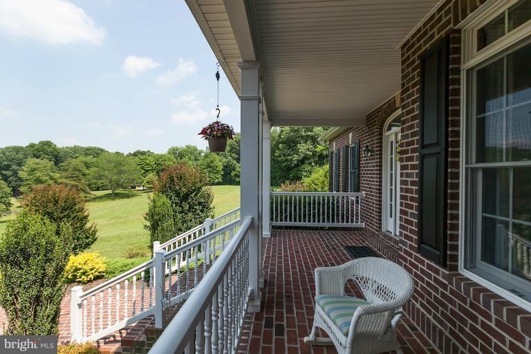 13763 Bottom Road Hydes, MD 21082 - Photo 13 of 30 Covered Front Brick Porch with Brick Walkway