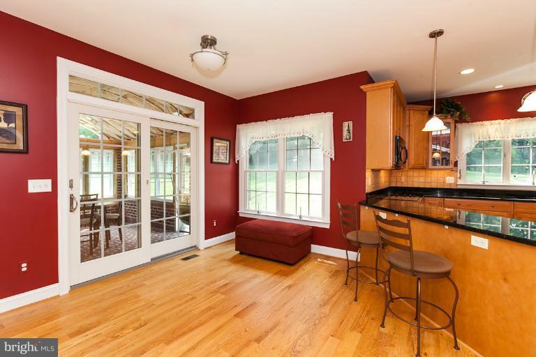 13763 Bottom Road Hydes, MD 21082 - Photo 28 of 30 Morning/Breakfast Area & Sliders to Sunroom