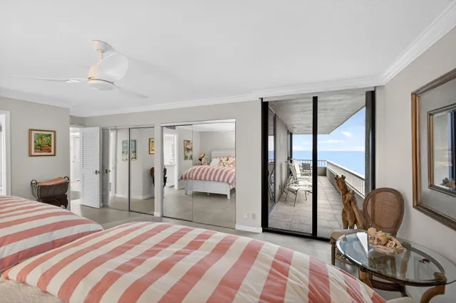 a view of a workspace with furniture and a flat screen tv