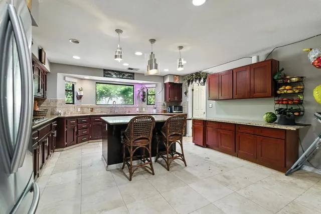 a view of a hallway with washer and dryer