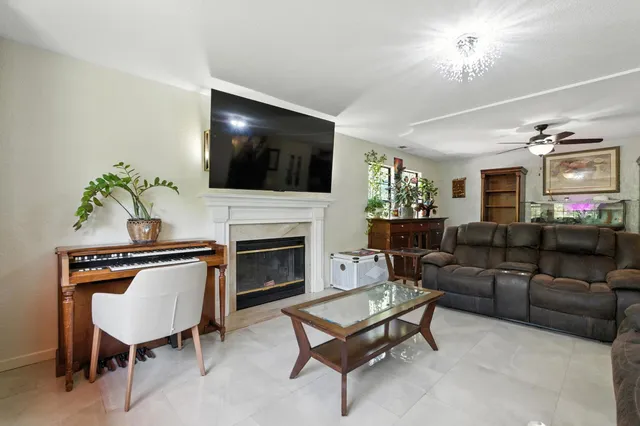 a kitchen with stainless steel appliances granite countertop a stove a refrigerator and cabinets