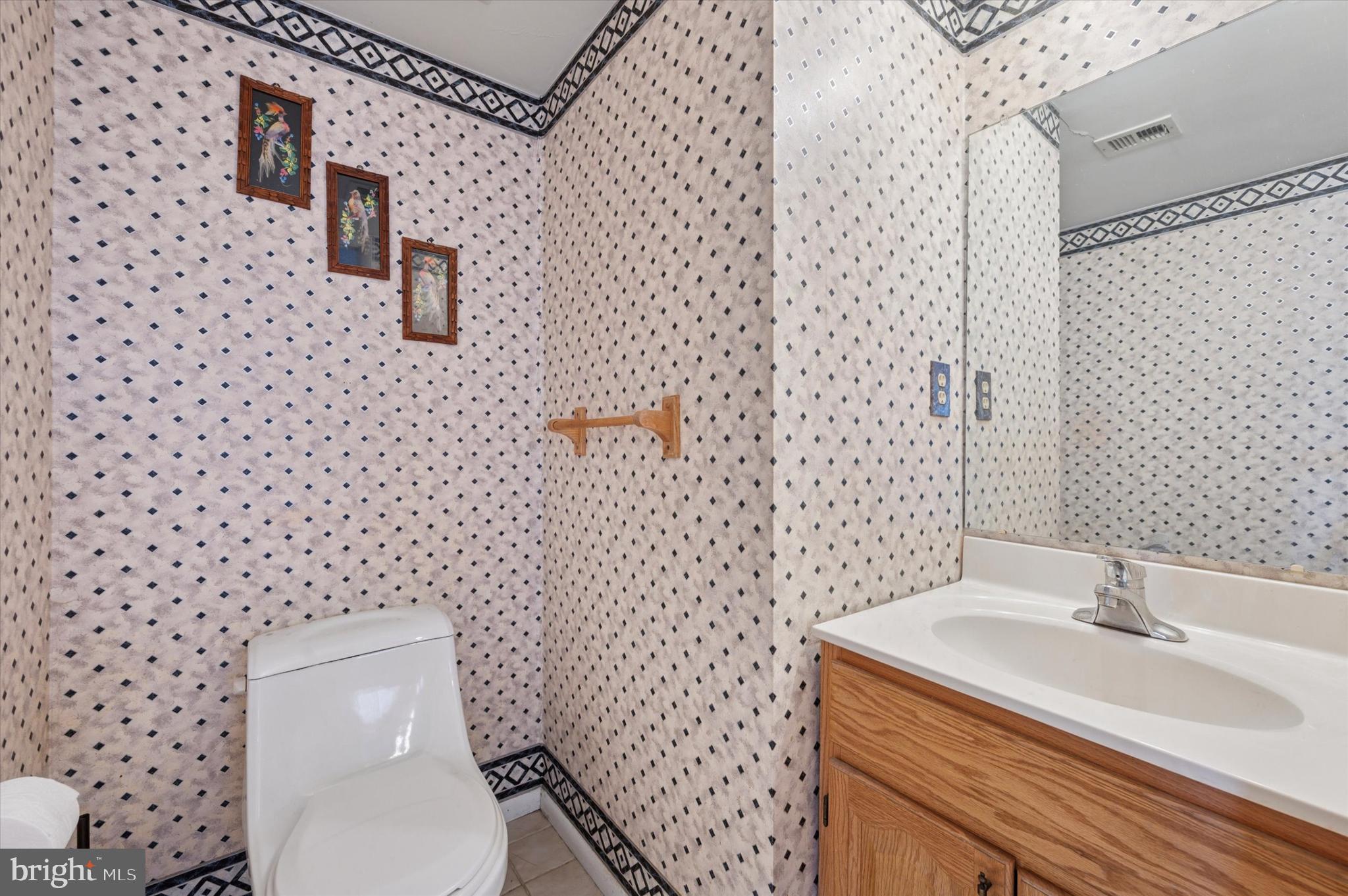 12818 Galdi Lane Philadelphia, PA 19154 - Photo 14 of 25 a bathroom with a sink and a toilet