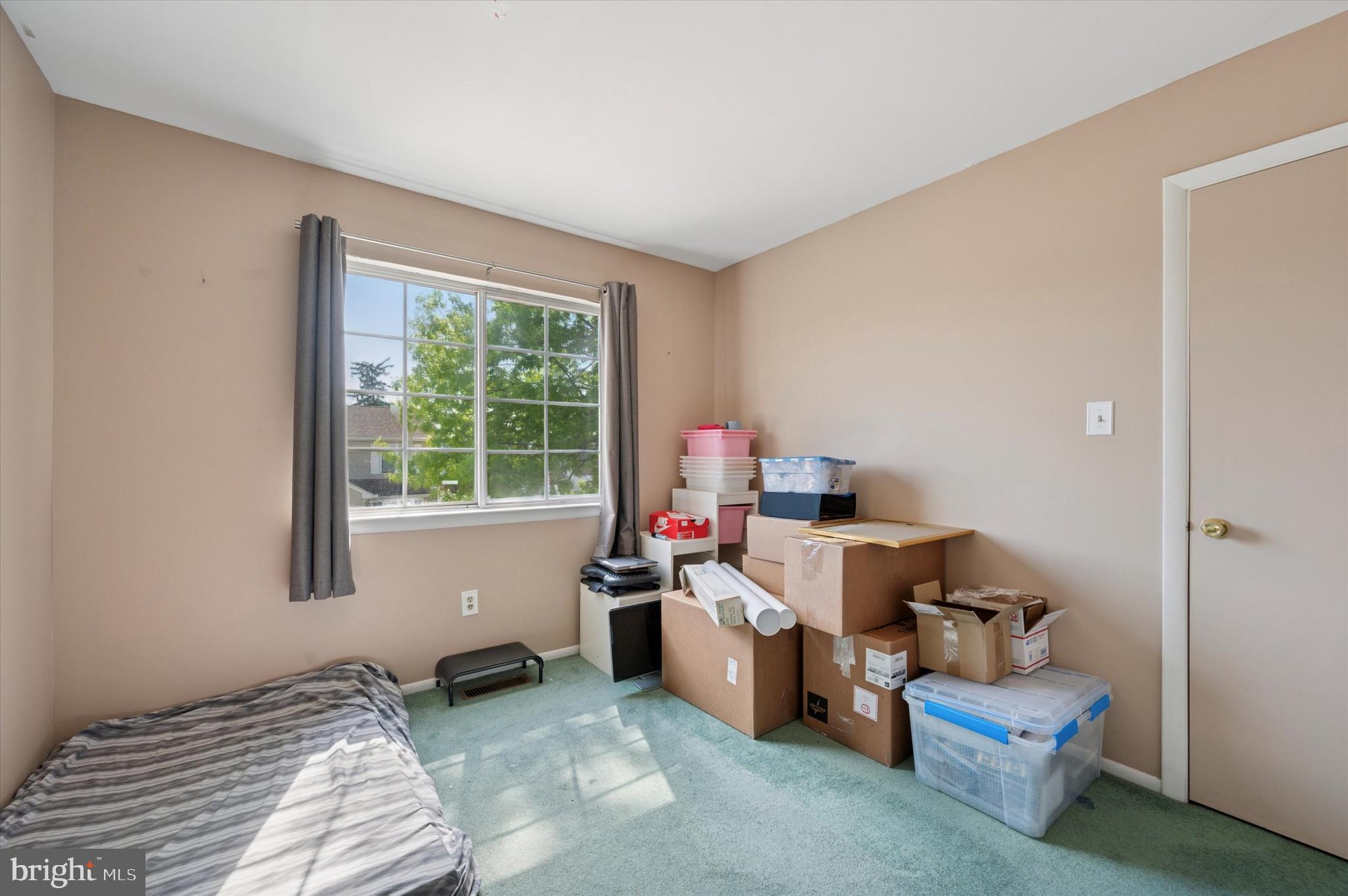 12818 Galdi Lane Philadelphia, PA 19154 - Photo 20 of 25 a bed room with a bed and a window