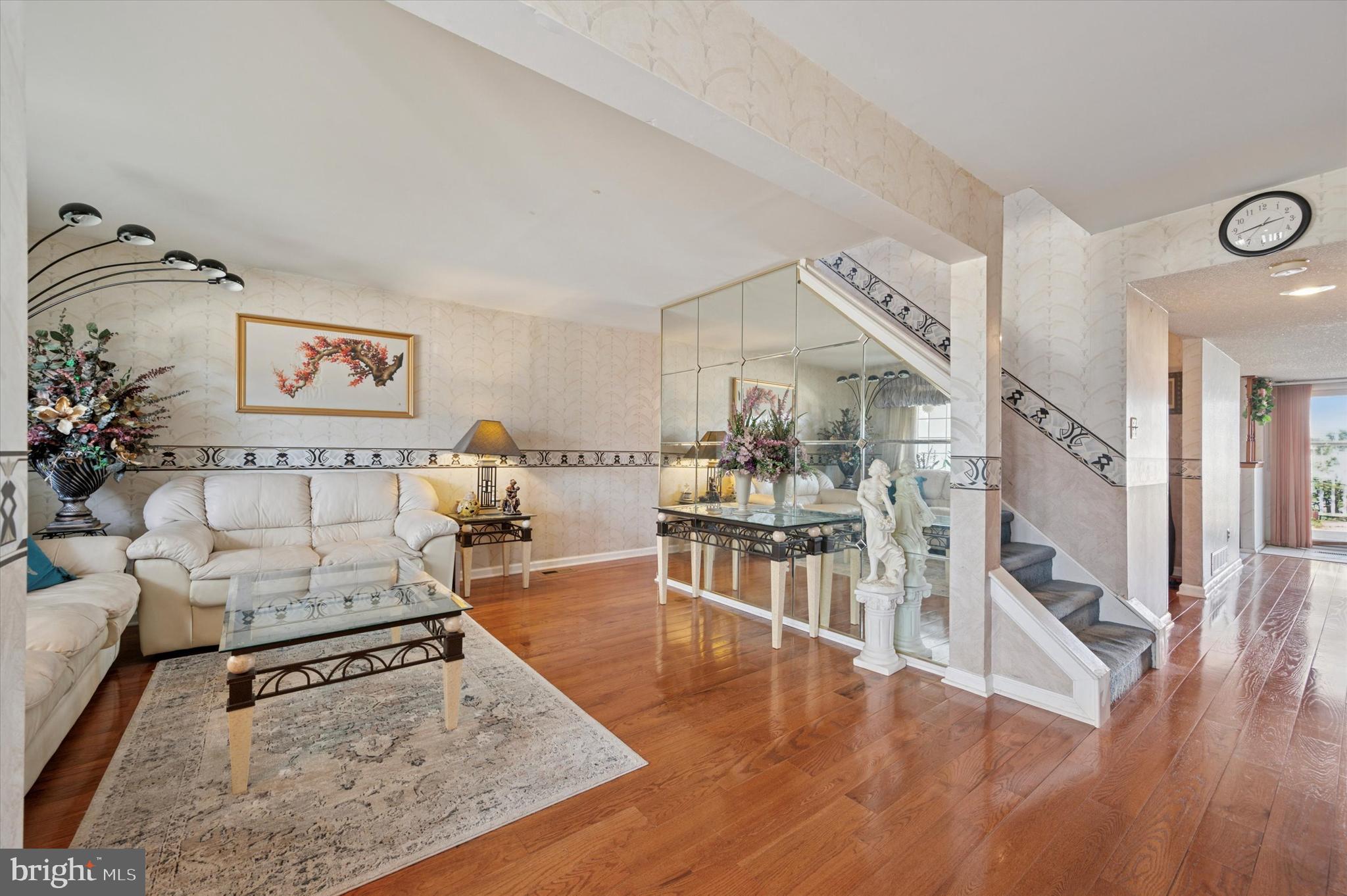 12818 Galdi Lane Philadelphia, PA 19154 - Photo 2 of 25 a living room with furniture and wooden floor
