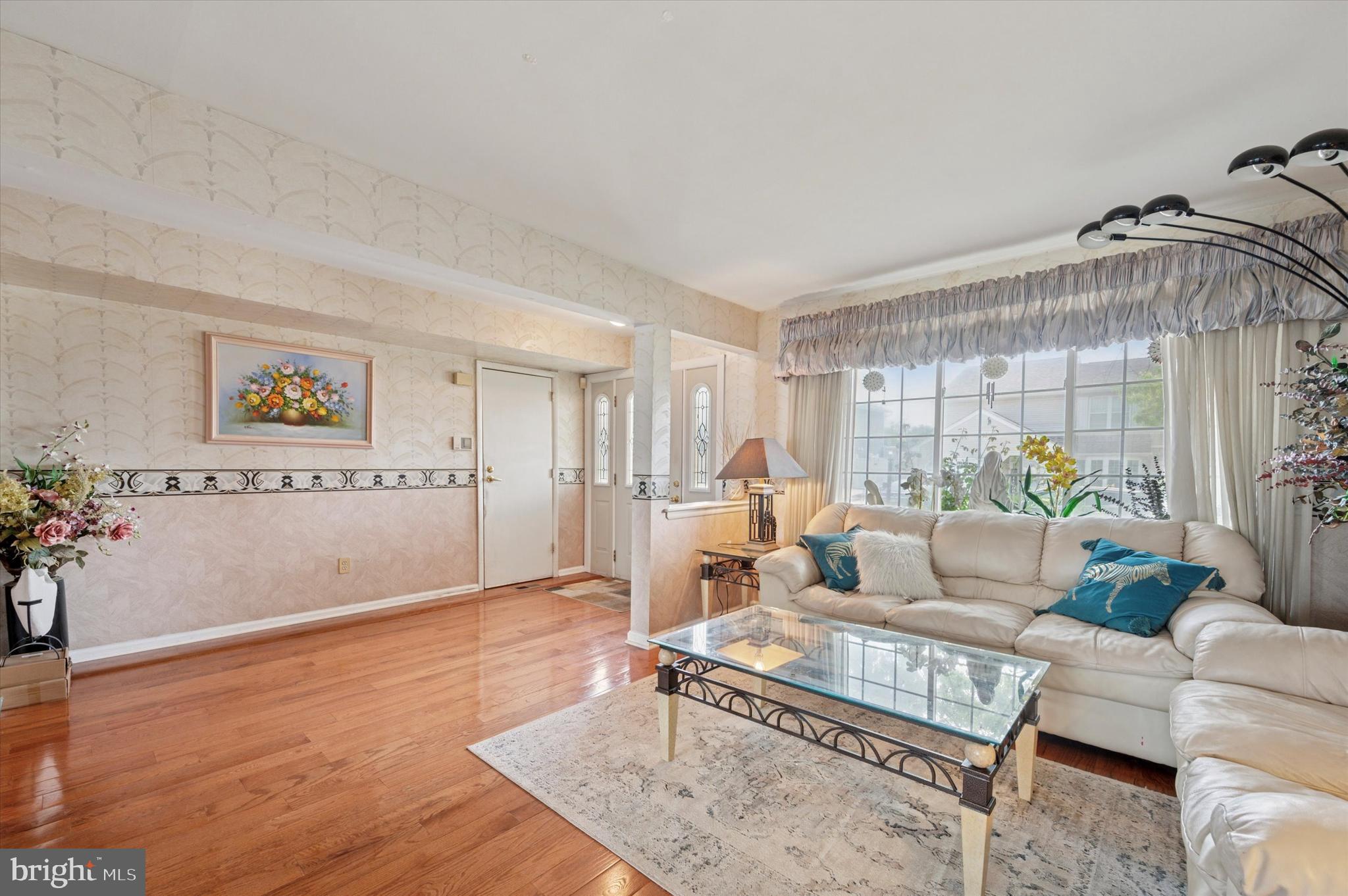 12818 Galdi Lane Philadelphia, PA 19154 - Photo 4 of 25 a living room with furniture and wooden floor