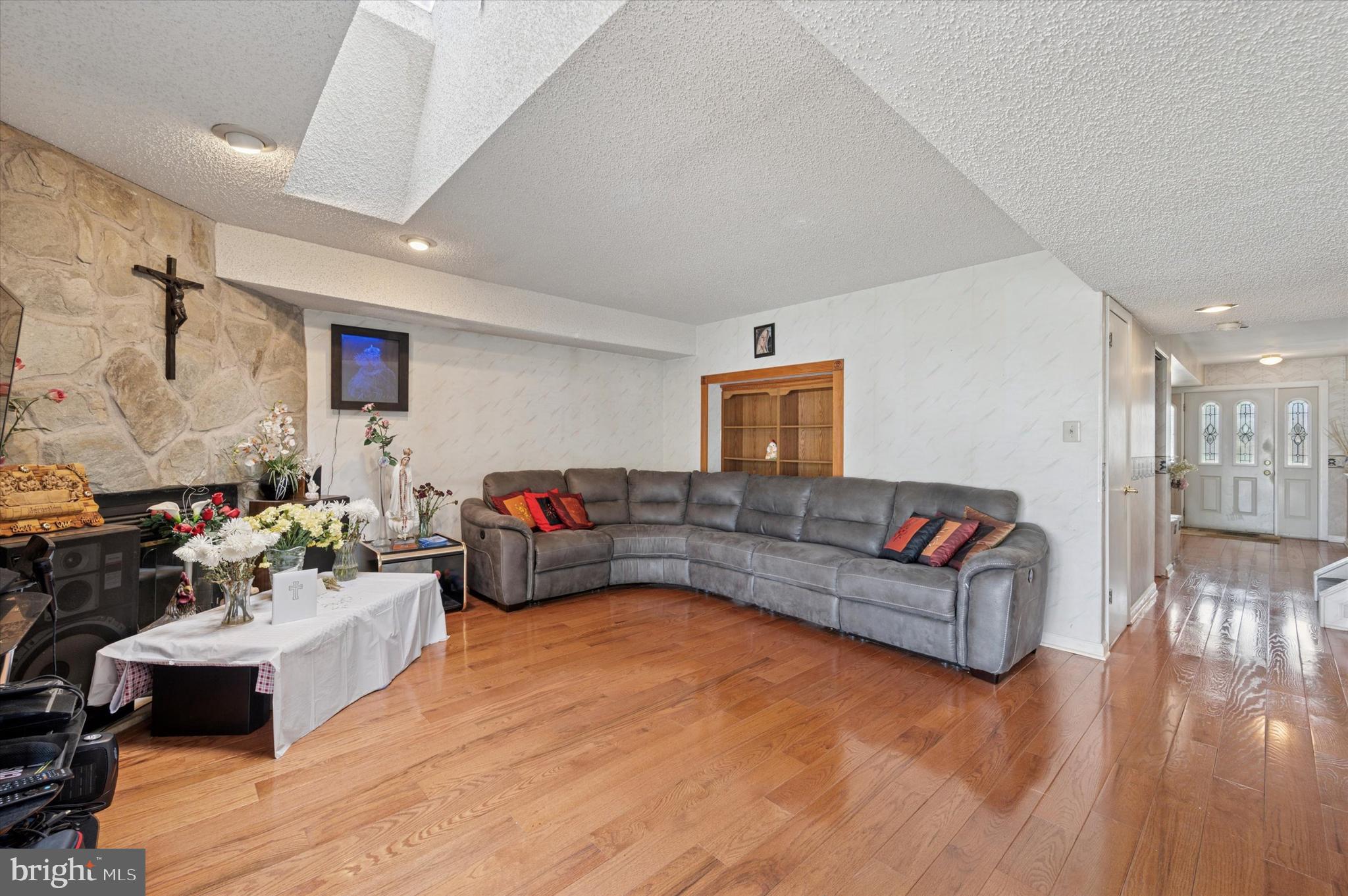 12818 Galdi Lane Philadelphia, PA 19154 - Photo 8 of 25 a living room with furniture and a wooden floor