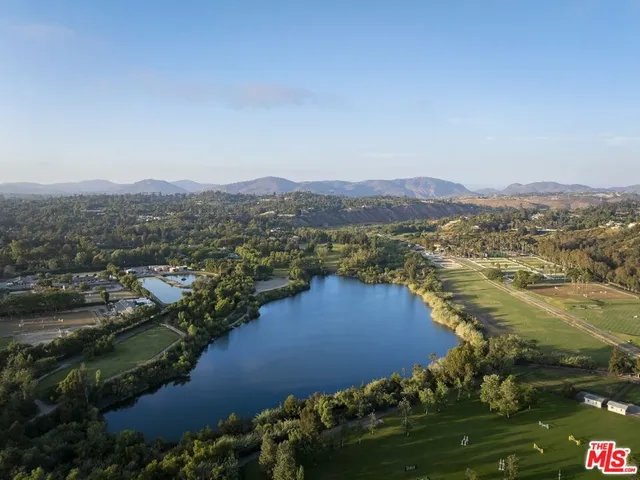 a view of a lake with mountains in the background