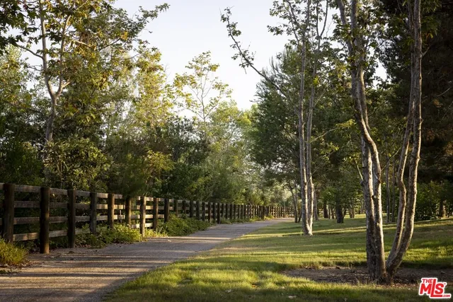 a view of a house with a big yard