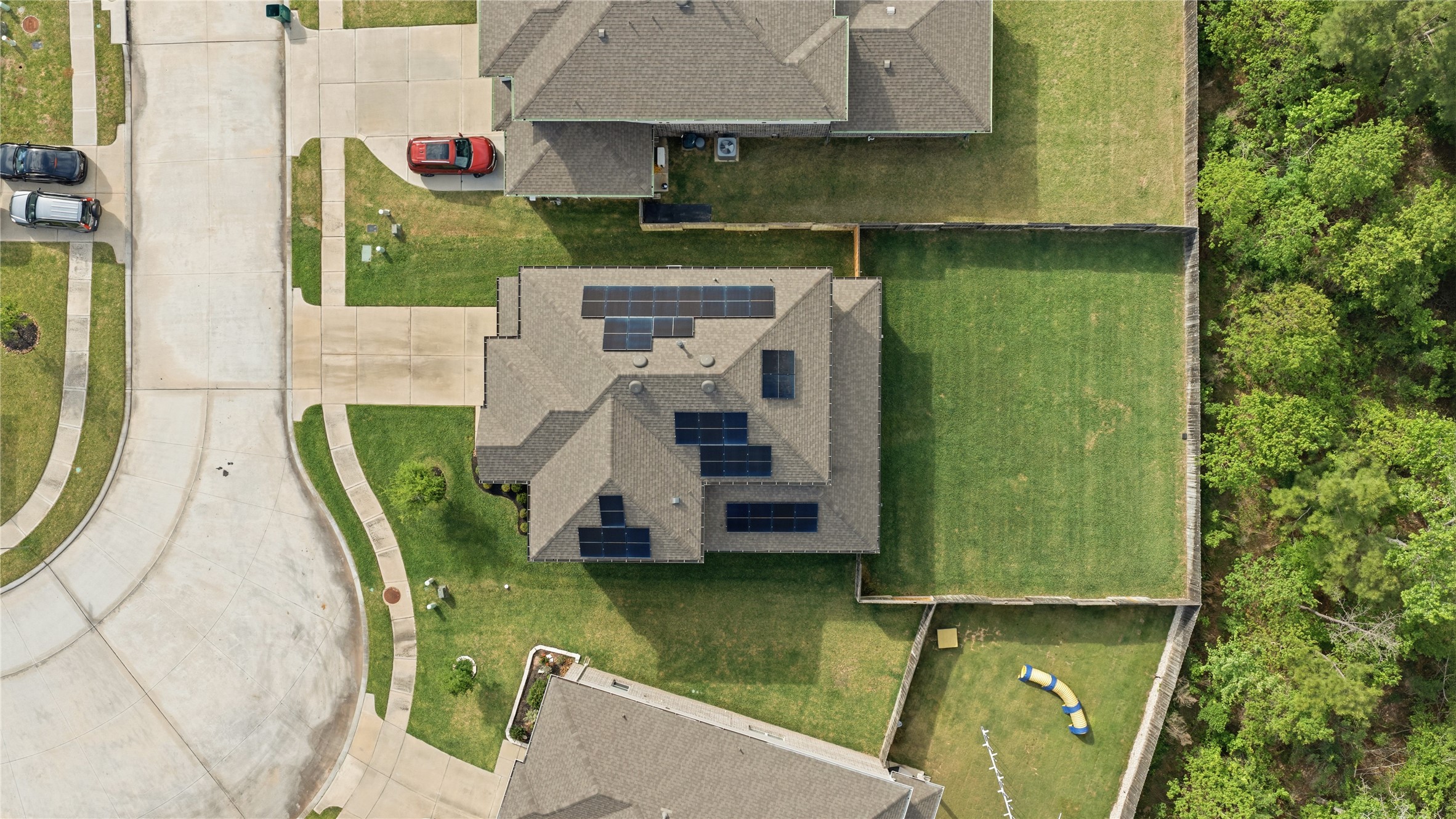 14108 Redfish Lake Conroe, TX 77384 - Photo 5 of 37 an aerial view of a house with swimming pool