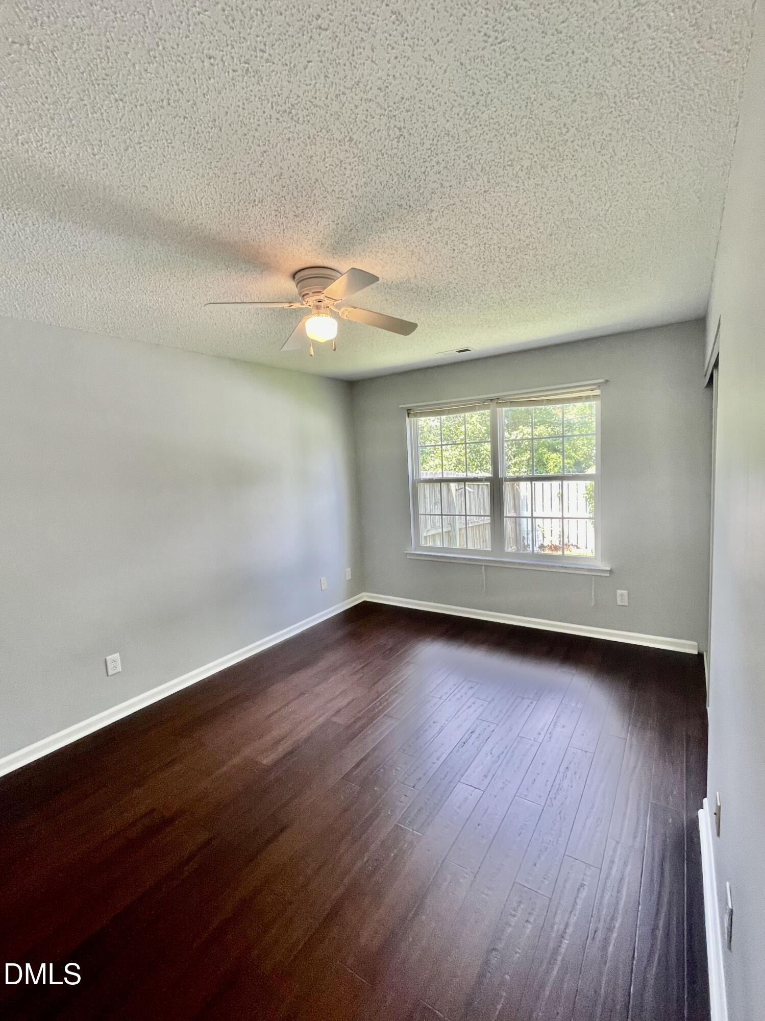5428 Roan Mountain Place Raleigh, NC 27613 - Photo 7 of 22 This bedroom is located on the back of the home, and has access to a full bath, making it a primary bedroom possibility if you don't want to use the upstairs suite.