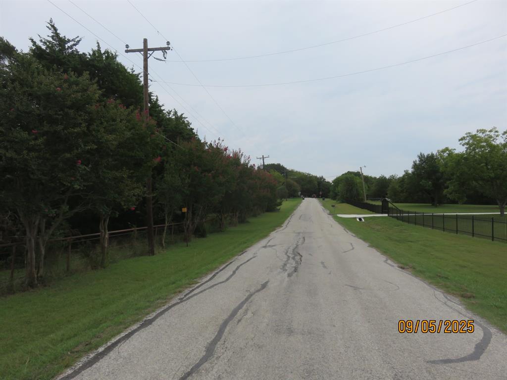 6 Highridge Farms Road Lowry Crossing, TX 75069 - Photo 9 of 19 a view of a lake with a big yard