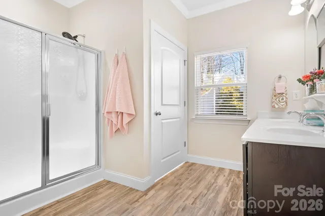 a view of kitchen with furniture and wooden floor