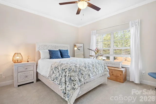 a bedroom with a bed and a cabinets