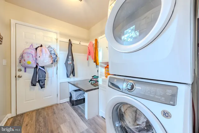 a view of storage and utility room with washer and dryer