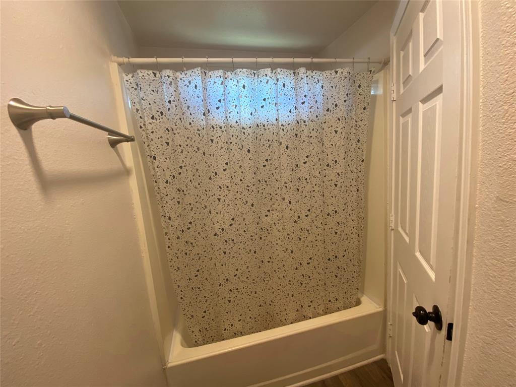 810 Greenville Road McKinney, TX 75069 - Photo 16 of 21 a bathroom with a shower