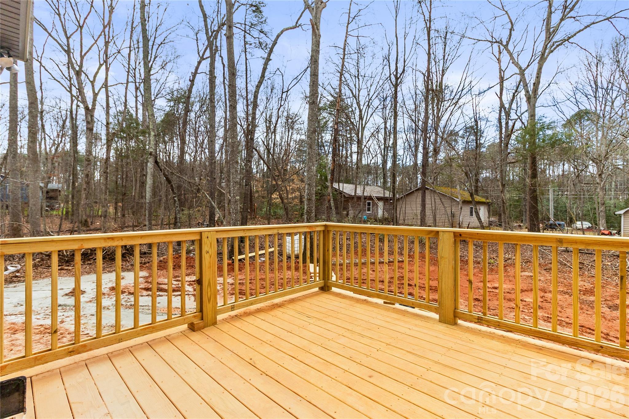 3692 Shannon Loop Denver, NC 28037 - Photo 43 of 47 a view of balcony with wooden floor and fence