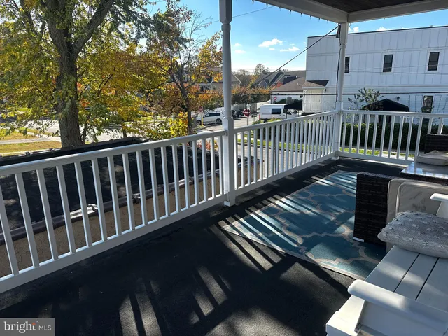 a view of balcony with furniture