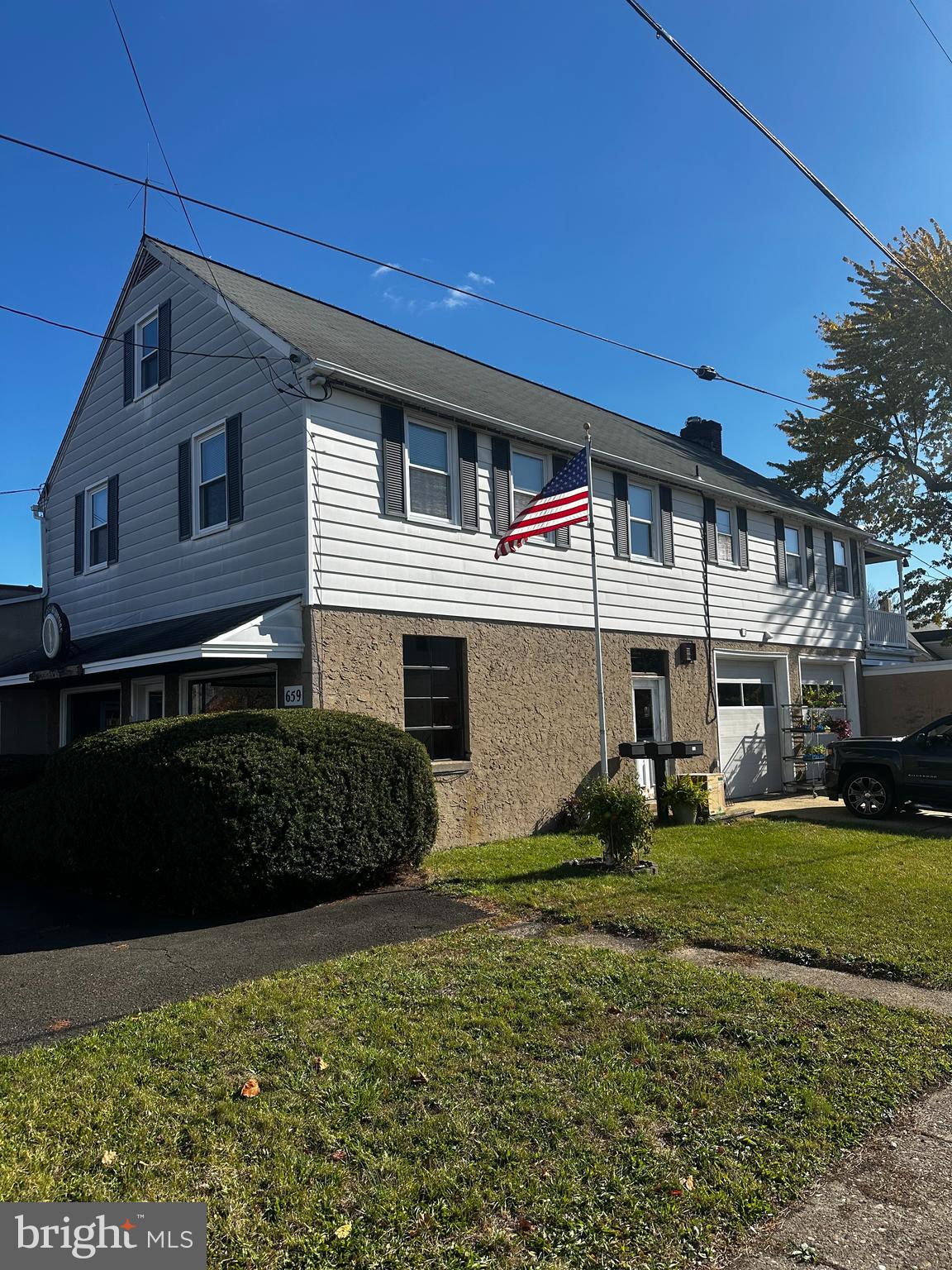 659 North Main Street Doylestown, PA 18901 - Photo 2 of 22 a front view of a house with a yard