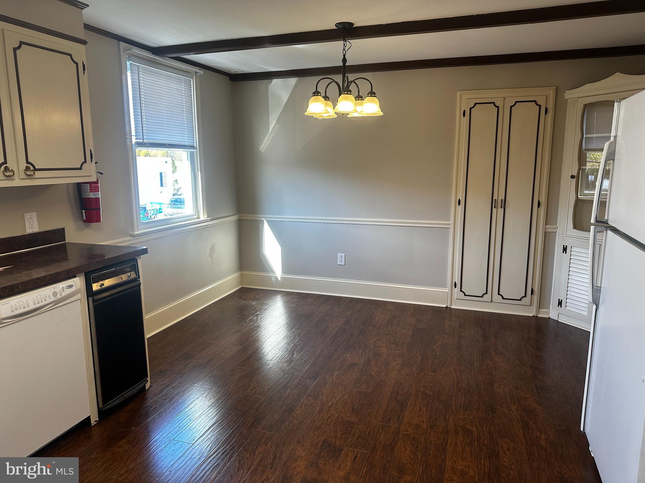 659 North Main Street Doylestown, PA 18901 - Photo 8 of 22 wooden floor in an empty room with a window