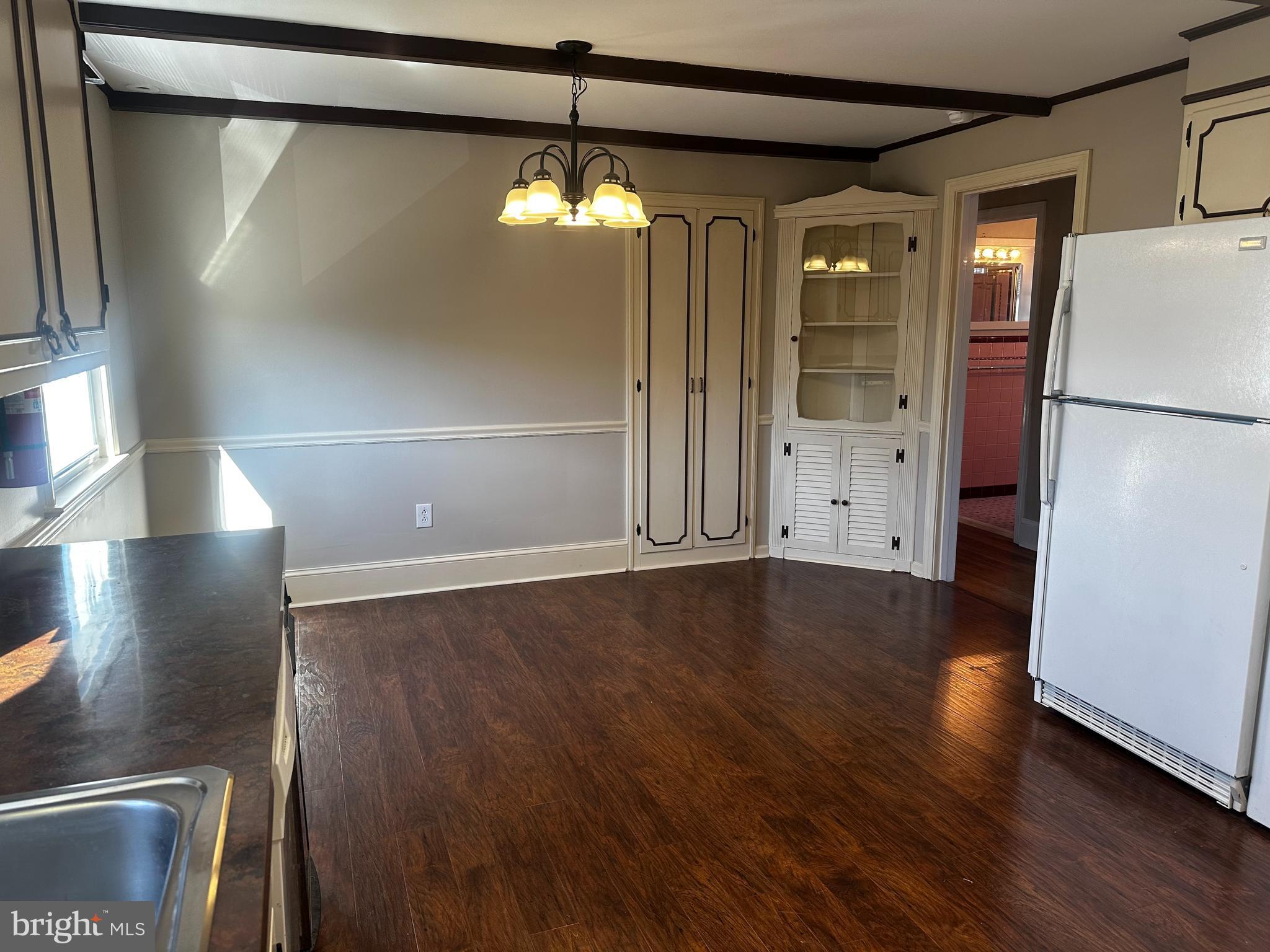 659 North Main Street Doylestown, PA 18901 - Photo 10 of 22 a view of an empty room with wooden floor and a window