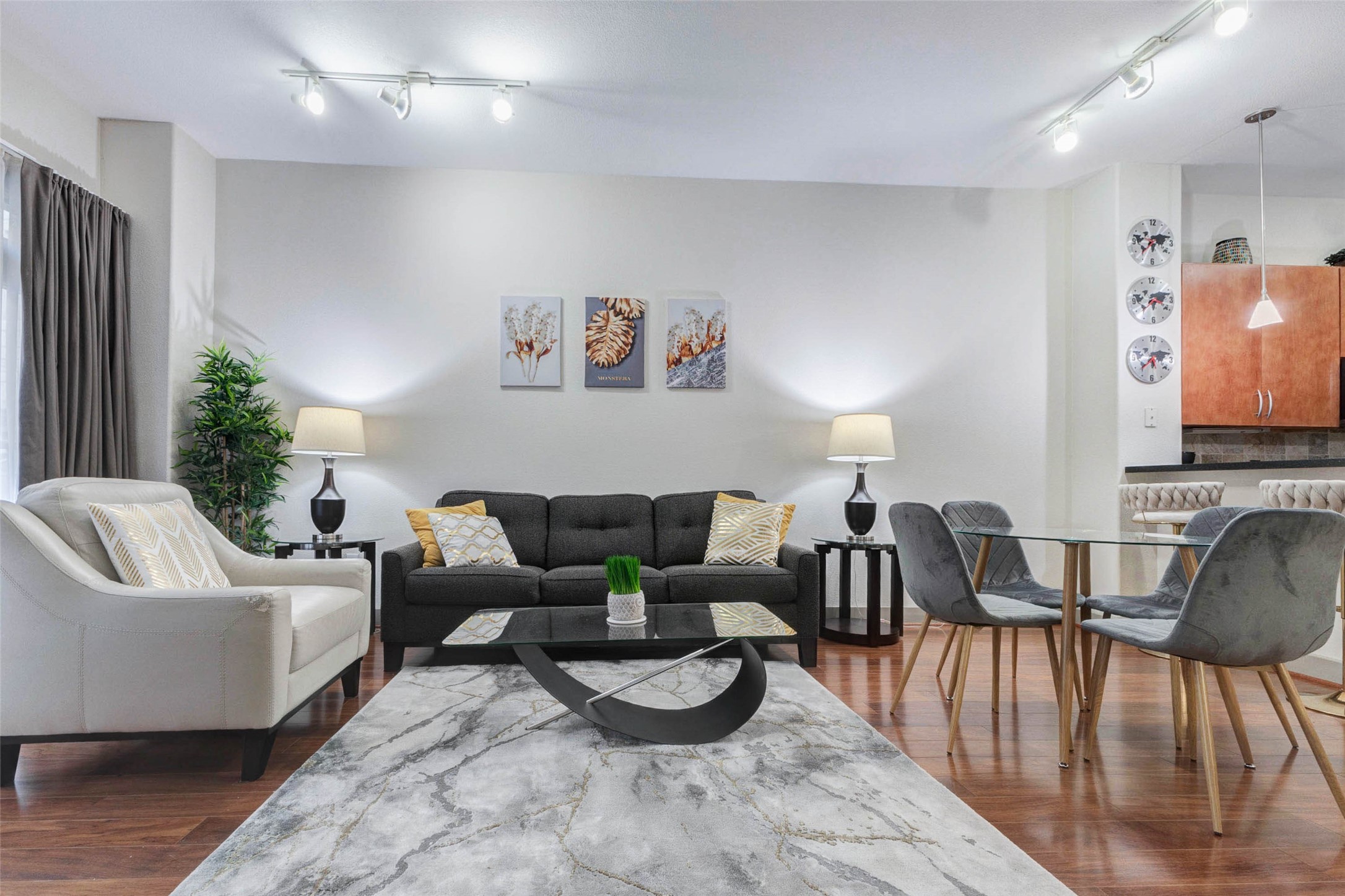 1901 Post Oak Boulevard, Unit 1106 Houston, TX 77056 - Photo 14 of 26 a living room with furniture and a flat screen tv