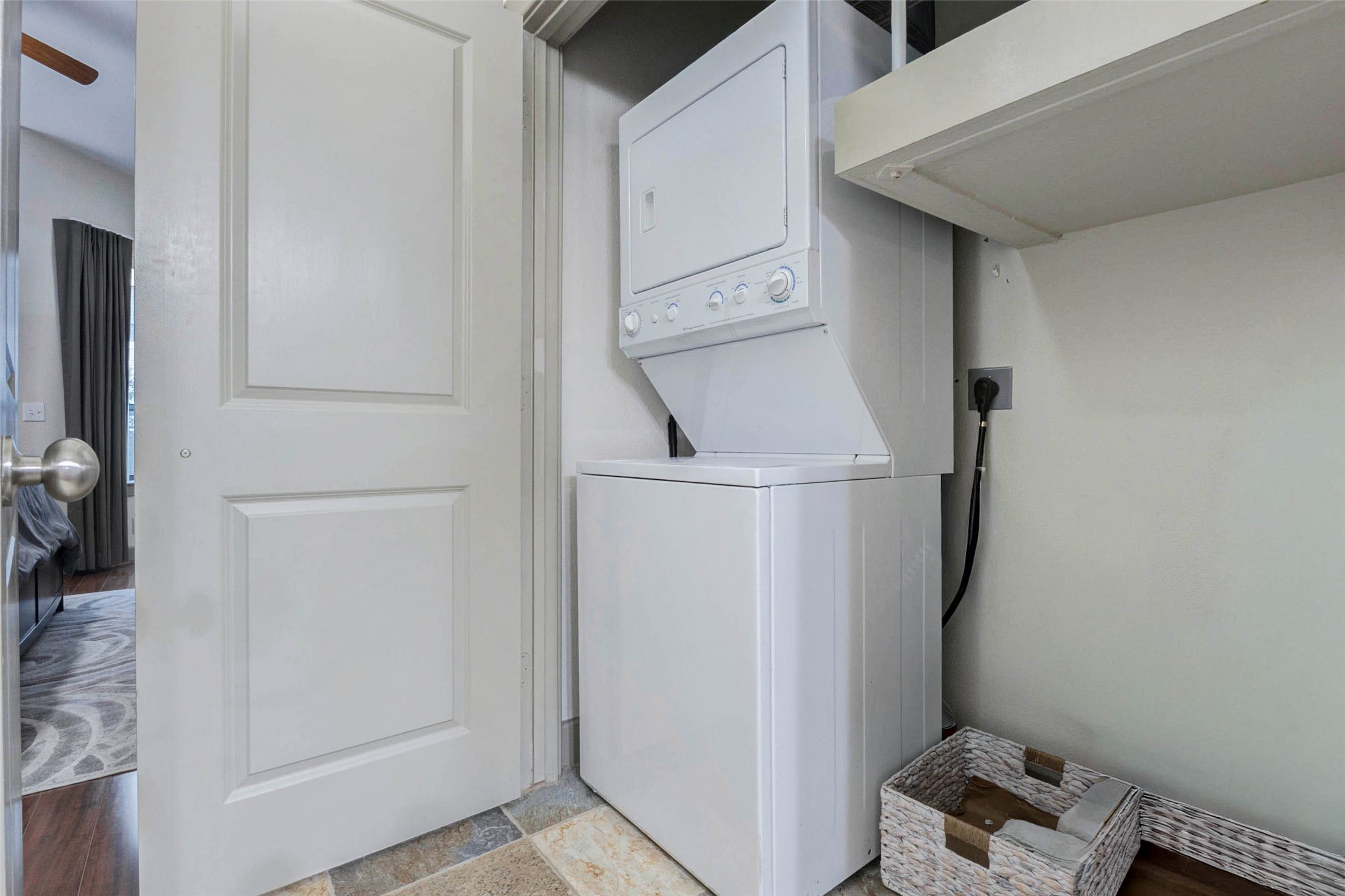 1901 Post Oak Boulevard, Unit 1106 Houston, TX 77056 - Photo 22 of 26 a room with storage and utility