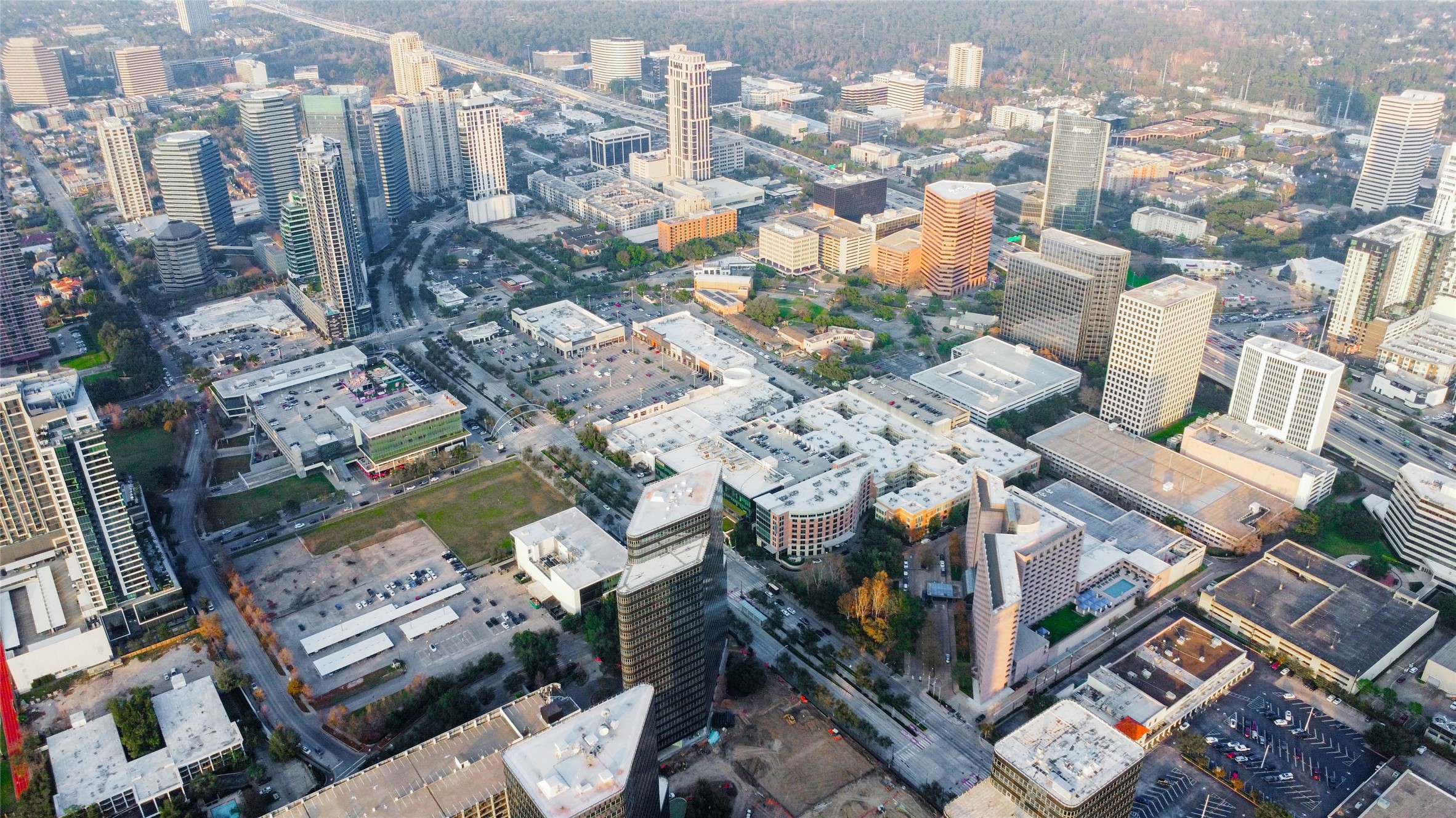 1901 Post Oak Boulevard, Unit 1106 Houston, TX 77056 - Photo 25 of 26 an aerial view of a city with lots of residential buildings