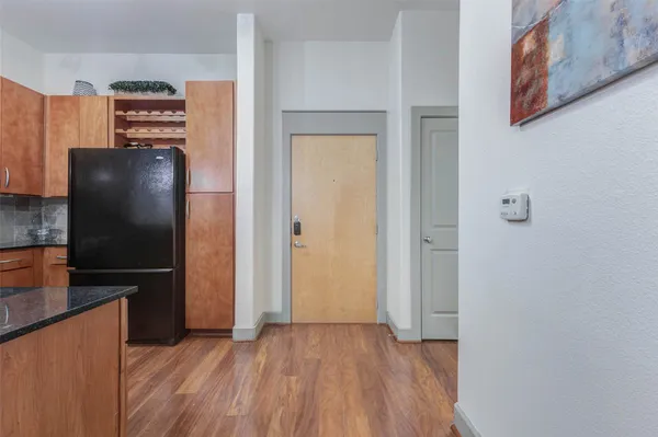 a kitchen with a sink and a stove top oven