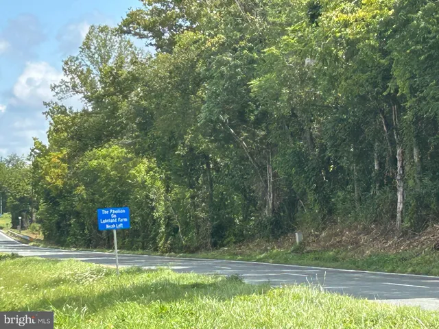 a view of swimming pool with a yard