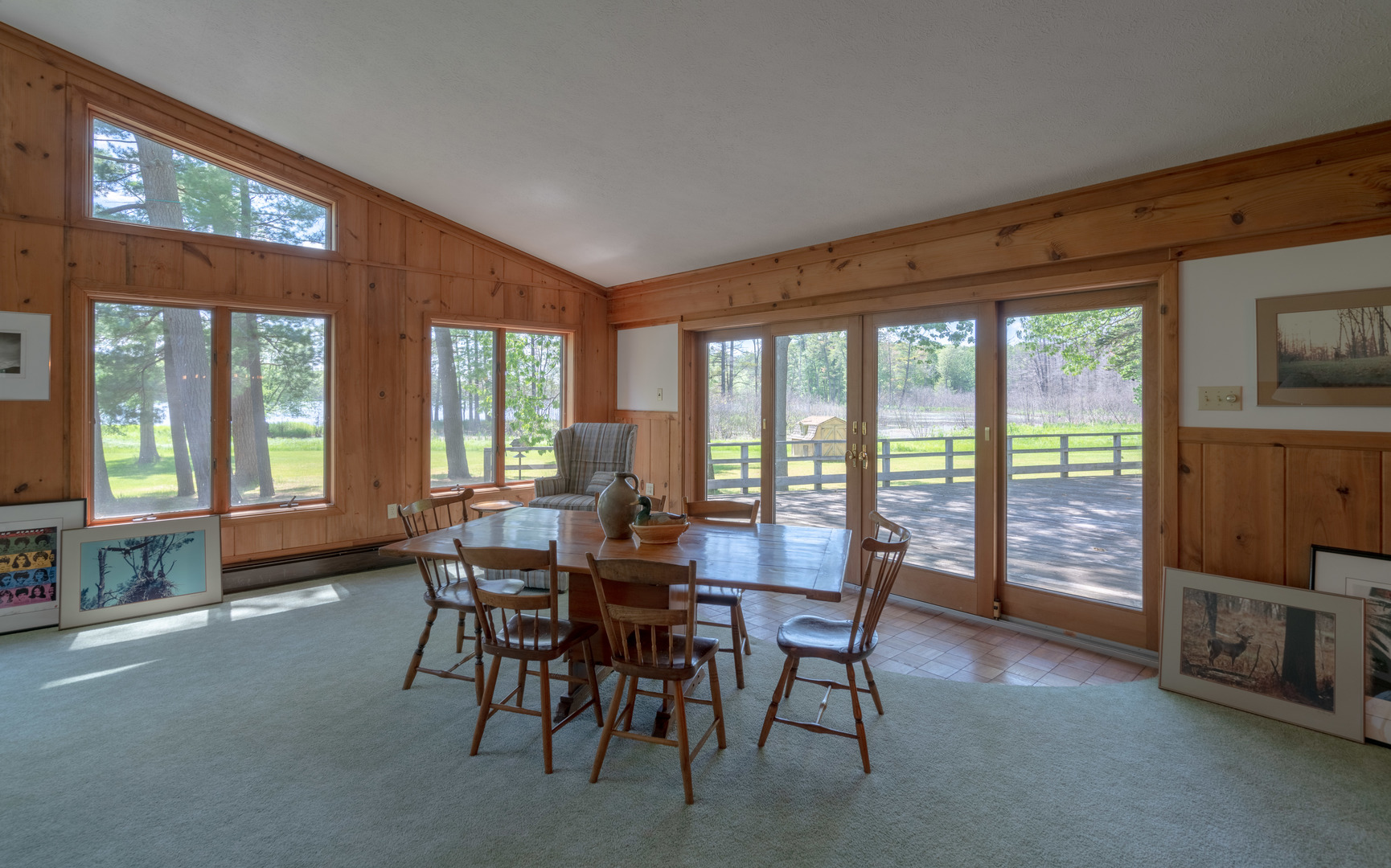 5021 Solomon Road Atlanta, MI 49709 - Photo 12 of 34 a view of a dining room with furniture window and outside view